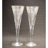 Two Waterford "incline geo" champagne flutes