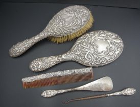 Sterling silver hand mirror and brush set