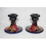 Pair Walter Moorcroft 'Pomegranate' candle holders