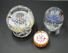 Three various decorative glass paperweights