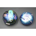 Two Colin Heaney iridescent art glass paperweights