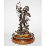 Antique Patinated cast metal cupid figure