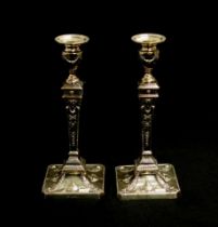 Pair of ornate sterling silver candlesticks