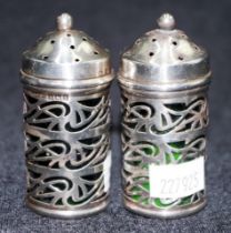 Pair George V silver pepperettes