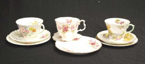 Two various English trios & a tennis cup & saucer