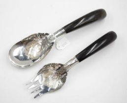 Pair Oriental horn handle silver serving pieces
