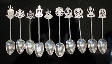 Ten Oriental silver teaspoons