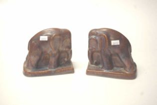 Pair of brown pottery elephant bookends