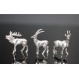 Three various silver forest animal miniatures