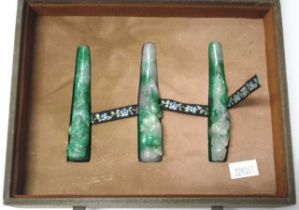 Three Chinese carved jade cigarette holders