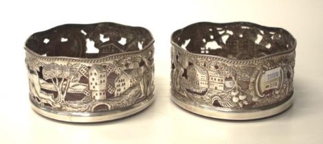 Pair of Irish sterling silver bottle coasters