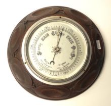 English carved wood backed wall barometer