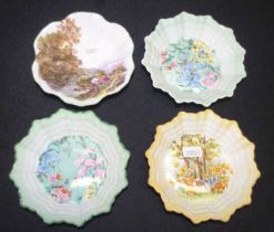 Four Shelley decorated butter dishes