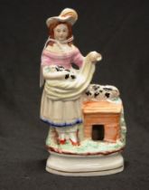 Victorian Staffordshire figure woman with rabbits