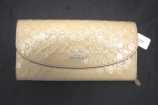 Coach signature patent beige leather ladies wallet