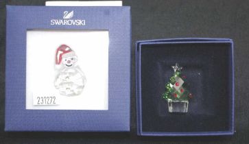 Two Swarovski crystal Christmas ornaments