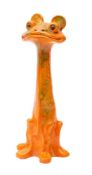 A William Baron (Barnstaple) pottery grotesque, of elongate frog-like form under uranium glazes,