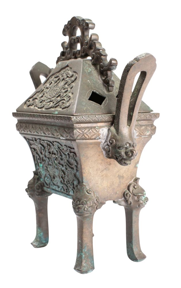 A Chinese bronze censer and cover of archaic design,