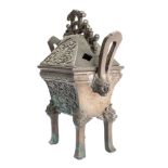 A Chinese bronze censer and cover of archaic design,