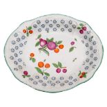 A Chelsea shaped oval dish moulded with panels of basket weave and flower heads,