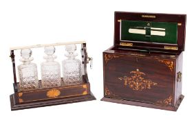 An Edwardian mahogany and inlaid stationery cabinet of rectangular outline,