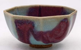 A Chinese porcelain bowl of octagonal form decorated with Jun glazes, 8cm.