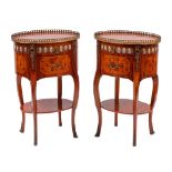 A pair of tulipwood marquetry, gilt metal and porcelain mounted petite commodes in Louis XV taste,