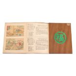 A Chinese book containing twenty four acts of Filial Piety with hand coloured illustrations,