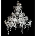 A contemporary cut glass three tier graduated twelve branch chandelier:,