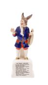 An Arcadian polychrome decorated china model of the Trusty Servant,