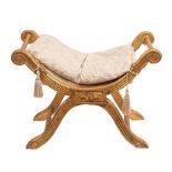 A Continental carved and giltwood 'X' frame stool in Louis XVI taste,
