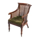 A Regency mahogany and canework library bergere,