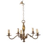 A brass four branch chandelier with central knopped stem with four scrolling branches terminating
