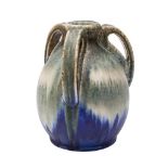 A Ruskin three-handled matt crystalline glazed vase covered in streaked blue,