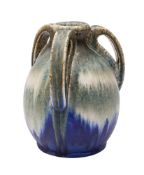 A Ruskin three-handled matt crystalline glazed vase covered in streaked blue,