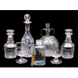 A mixed group of glass, comprising a silver mounted decanter, a pair of smaller decanters,
