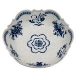 A First Period Worcester blue and white junket dish moulded with foliage and shells,