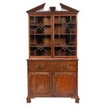 A George III mahogany and glazed secretaire bookcase, early 19th century,