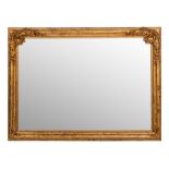 A gilt composition framed rectangular wall mirror in 18th century taste,