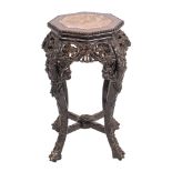 A Chinese carved hardwood and marble inset stand,