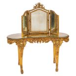 A giltwood and composition kidney shaped dressing table in Louis XV taste,