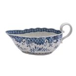 A First Period Worcester blue and white sauceboat of oval fluted form,