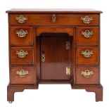 A George II mahogany kneehole desk,