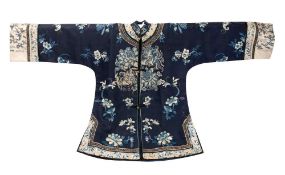A mid/late 19th century Chinese embroidered court jacket with all over decoration of floral sprays