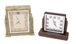 An Art Deco green onyx mantel clock having an eight-day duration timepiece movement,