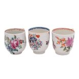 A group of three 18th century English coffee cups comprising a Lowestoft Curtis pattern cup,