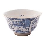 An English blue and white delftware chinoiserie punch bowl of straight sided tapering form with