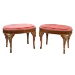 A pair of walnut and gilt bronze mounted oval stools in Louis XVI taste,