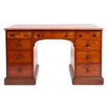 A Victorian mahogany pedestal desk in George III style,