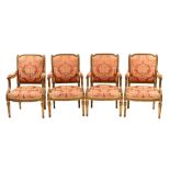 A suite of four carved and giltwood fauteuils in late Louis XV Transitional style,